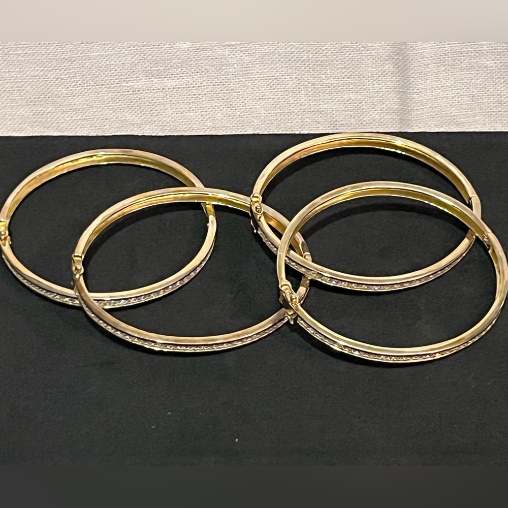 Bundle of Gold Plated Bracelets.